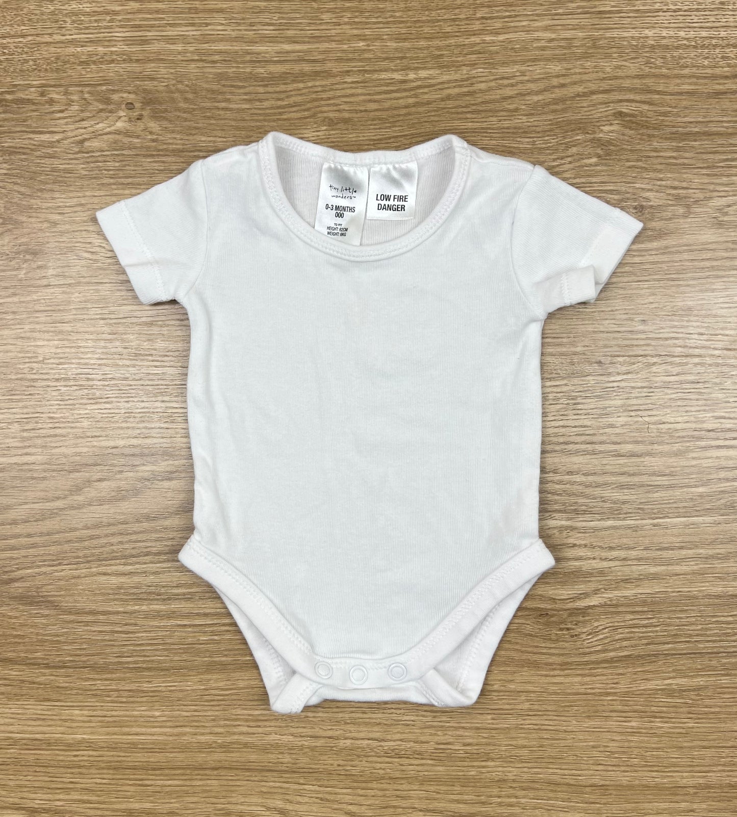 Tiny Little Wonders White SS Bodysuit - Size 000